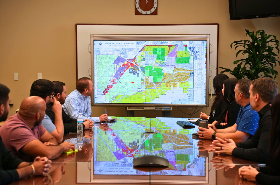 Group of City Planners Reviewing Map